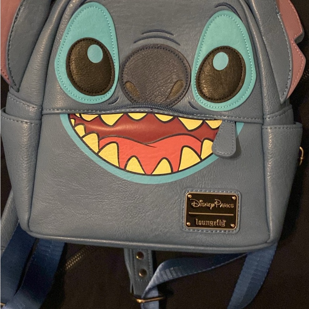 Loungefly blue faux leather mini backpack with gold plaque